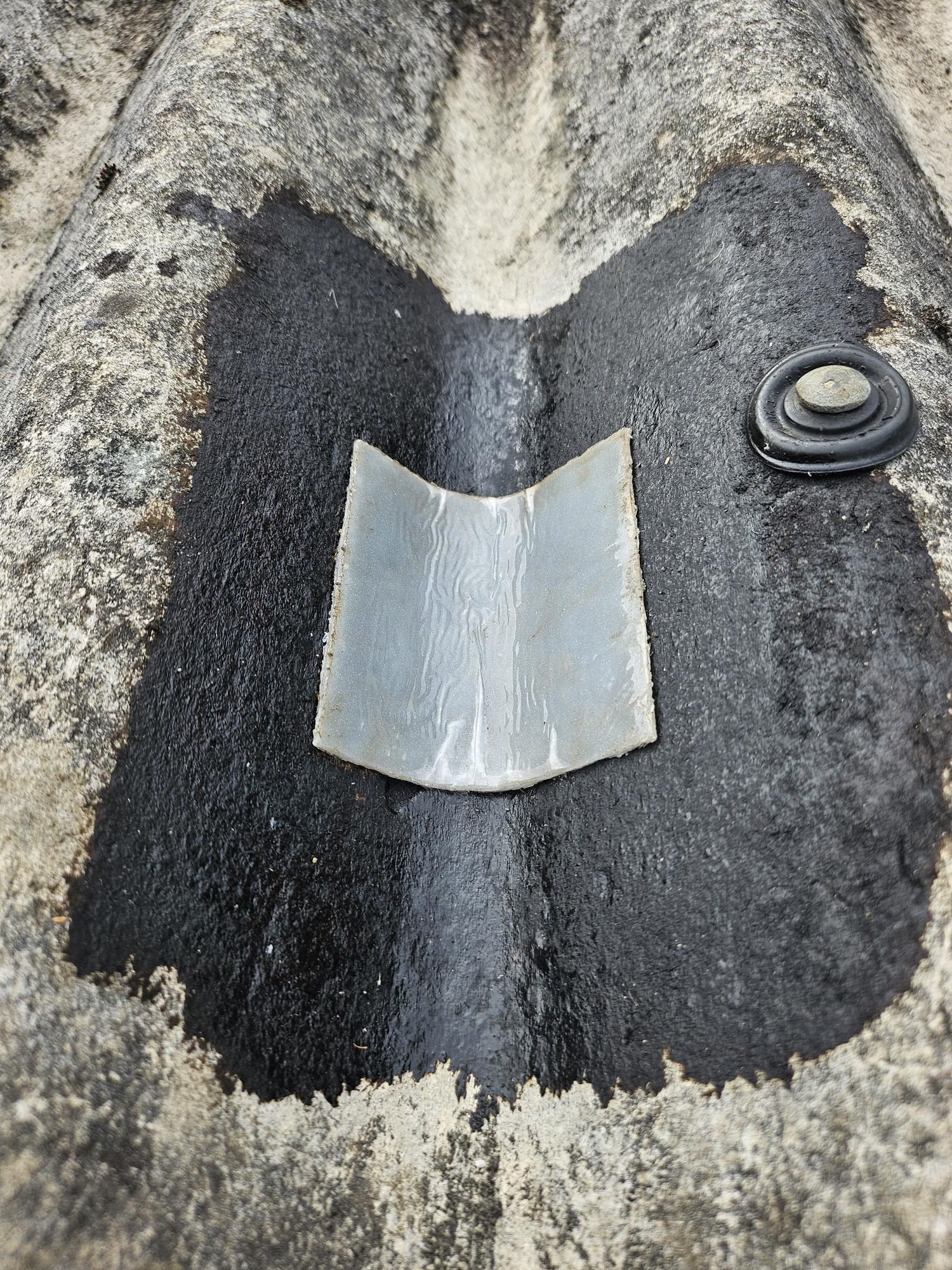 Hole repair on garage roof