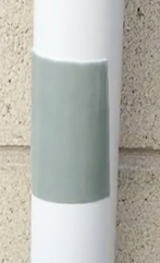 A broken gutter sealed with a SpeedPatch